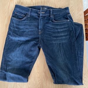 Men’s tapered Adrien Jeans in soft dark blue denim.